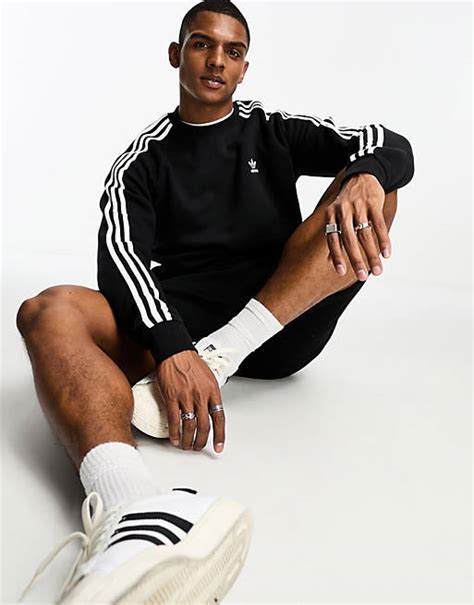 adidas originals sweatshirt met drie strepen in zwart|ADIDAS ORIGINALS Sportsweatshirt 'Adicolor Classics Sst' in .